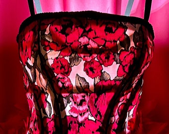 One of a Kind Tramp Lamp Crafted from A Pink and Black Floral Printed Corset Top with Black trim and Dark Pink Feathers at the Bottom