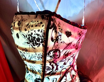 One of a Kind Tramp Lamp Crafted from a Black and Cream Floral print Corset Top Trimmed in Cream feathers with a Black sheer Skirt overlay.