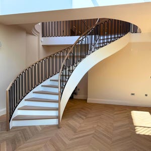 Curved Bespoke Staircase Design - Bespoke Staircases - Wood & Metal Balustrades - Space - Saving staircase
