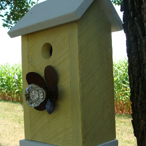 Old Yellow Birdhouse Handmade with Antique Glass Door Knob and Rusty Metal Flower Outdoor Garden Decor