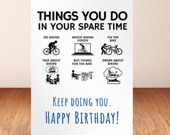 Puede incluir: Una tarjeta de felicitación blanca con el texto "THINGS YOU DO IN YOUR SPARE TIME" e ilustraciones de actividades ciclistas. Debajo, se lee "KEEP DOING YOU. HAPPY BIRTHDAY!" con una pancarta azul "Digital Print at Home card!"