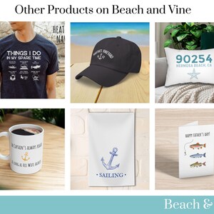 May include: A collection of products featuring a nautical theme.  A t-shirt with the text "Things I do in my spare time" and a list of nautical activities. A black baseball cap with the text "Mariner's Vineyard" and an anchor. A white pillow with the text "90254 Hermosa Beach, CA" and a starfish. A white mug with the text "The Captain's Always Right...As Long As His Wife Agrees" and an anchor. A white tea towel with a blue anchor and the text "Sailing". A white card with the text "Happy Father's Day!" and a fishing line with three fish.