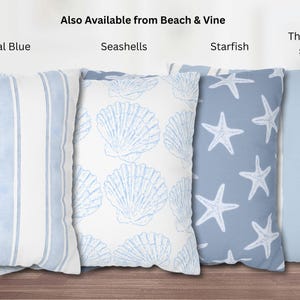 May include: Four decorative throw pillows with coastal themes. Designs include vertical stripes, seashells, starfish, and thick stripes. The pillows are in shades of blue and white, with the text "Coastal Blue", "Seashells", "Starfish", and "Thick/Little stripes".