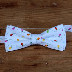 Boys Christmas holiday lights on white cotton bow tie - kids holiday bowtie - infant baby toddler child preteen, white green yellow pink