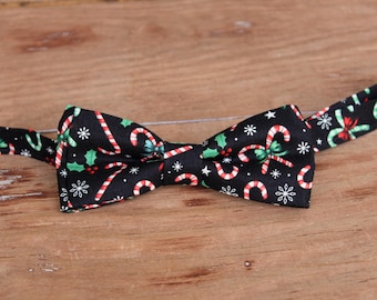 Mens Candy Cane and Holly Christmas Bow Tie, adults holiday bowtie, adjustable pre-tied cotton black bow tie, red and green tie, party tie