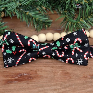 Boys Christmas candy cane and holly bow tie on black cotton - kids holiday bowtie - infant baby toddler child preteen, black red green