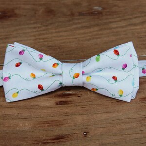 Boys Christmas holiday lights on white cotton bow tie - kids holiday bowtie - infant baby toddler child preteen, white green yellow pink