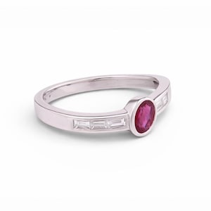 Oval Ruby Bezel Ring with Baguette Diamond Band