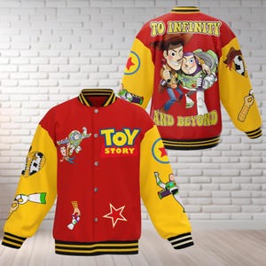 May include: A red and yellow varsity jacket with a Toy Story theme. The front features the Toy Story logo and characters, while the back says "To Infinity and Beyond" with Woody and Buzz Lightyear.