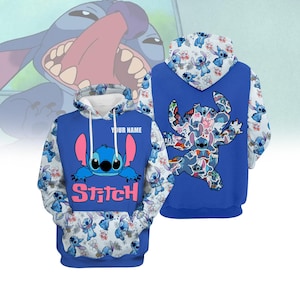 May include: Blue hooded sweatshirt with a white and blue pattern featuring Stitch from Lilo & Stitch. The front of the sweatshirt has a cartoon image of Stitch with the word "Stitch" below it. The back of the sweatshirt has a larger image of Stitch made up of smaller Stitch images.
