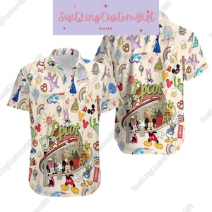 May include: A beige button-up shirt with a colorful pattern featuring Mickey Mouse, Minnie Mouse, Donald Duck, and other Disney characters. The shirt has a white background with a variety of colorful images, including rainbows, pretzels, and balloons. The shirt has a large image of the Epcot Center in the middle of the shirt. The shirt is a Hawaiian style shirt.