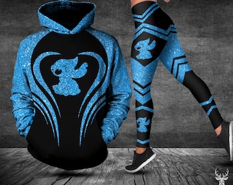 May include: A blue and black hoodie and leggings set with a glitter pattern. The design features a blue Stitch character from the Disney movie Lilo & Stitch.