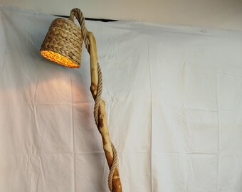 Wooden floor lamp from natural wood found on yhe river side