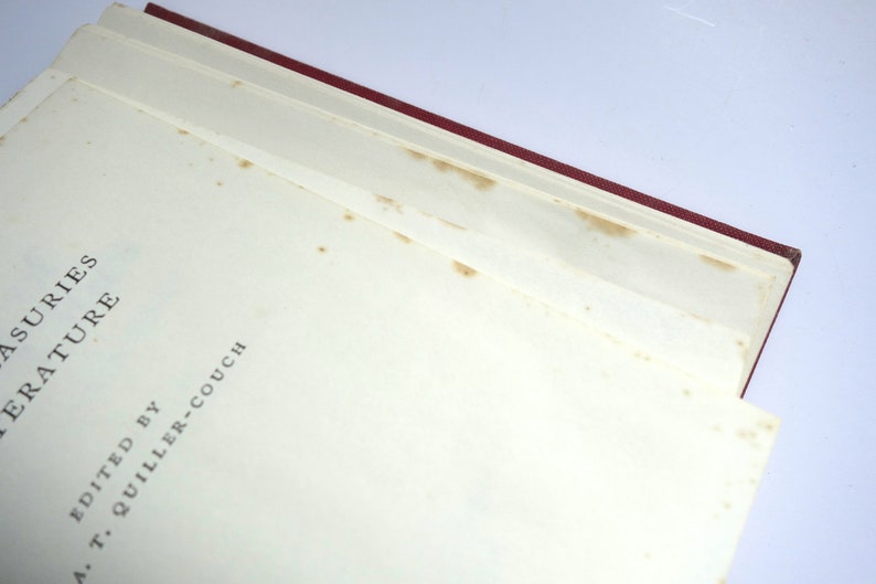 May include: Close-up of the title page of a book titled "Treasuries of Literature" edited by A. T. Quiller-Couch.