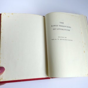May include: An open book with a red cover. The title page reads "The Kings Treasuries of Literature" edited by "Sir A.T. Quiller-Couch".