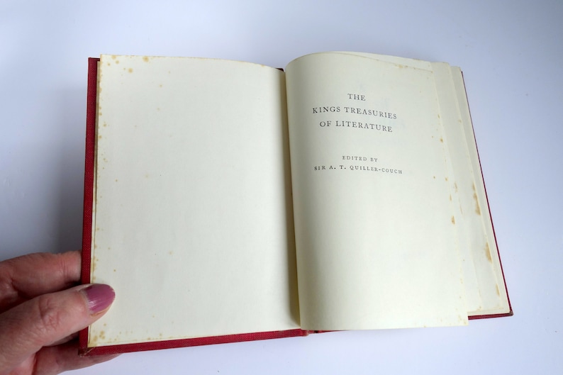 May include: An open book with a red cover. The title page reads "The Kings Treasuries of Literature" edited by "Sir A.T. Quiller-Couch".