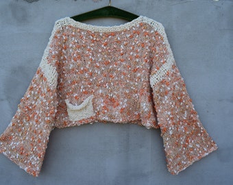 Orangefarbener Strickpullover