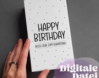 May include: A white card with black polka dots and the text "Happy Birthday" in black. The card also has the text "Alles Liebe zum Geburtstag!" in black.