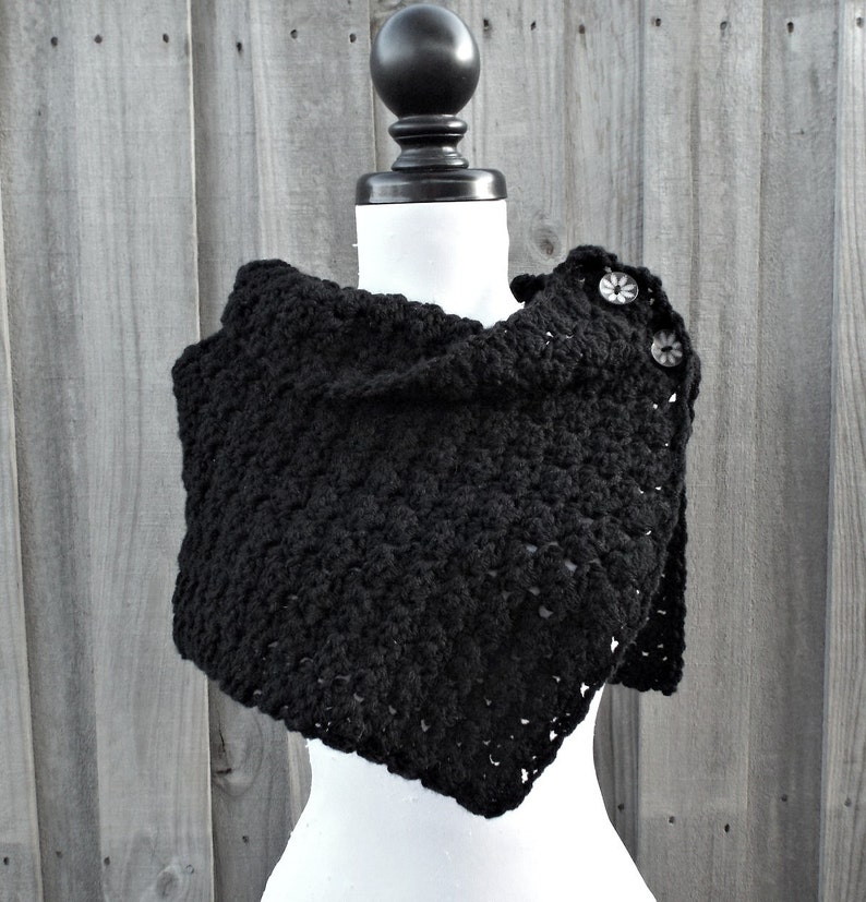 A crochet cowl in black.