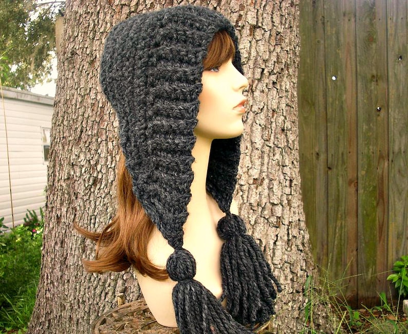 A crochet pattern for a tassel hat.
