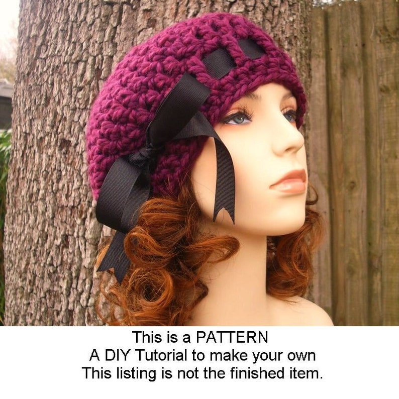 May include: A crochet pattern for a burgundy beret with a black ribbon bow. This listing is a DIY tutorial to make your own beret, not the finished item.