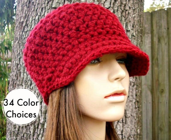 red newsboy hat