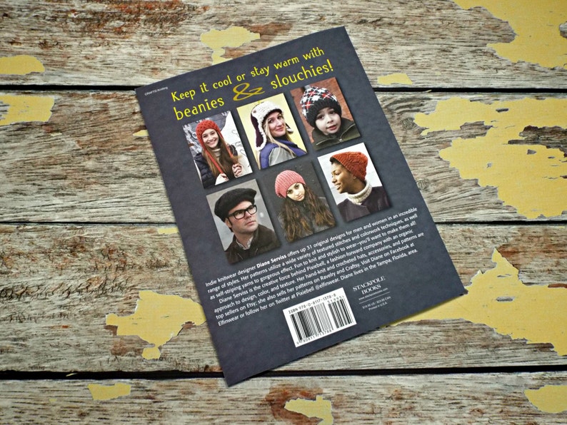 May include: Book cover with the title "Keep it cool or stay warm with beanies & slouchies!"  The cover features photos of people wearing various knitted hats. The text on the back of the book describes the book as a collection of original designs for men and women.