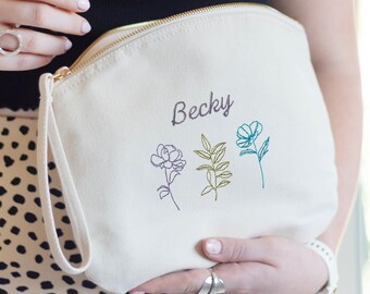 Borsa per il trucco personalizzata con tre fiori ricamati