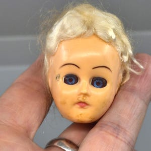Vintage Replacement Dolls Head - Hard Plastic - with blonde hair and sleepy blue Blue Eyes 1 5/8&quot; tall #31