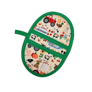 May include: An oven mitt with a green border and handle, featuring a farm-themed pattern. The pattern includes a red tractor, cows, pumpkins, and other farm animals. The text "collisionware" is visible on the mitt.