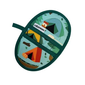 May include: An oval-shaped pot holder with a teal background featuring camping-themed illustrations. The design includes tents, trees, a canoe, and a small camper. The pot holder is trimmed with a dark green border and has a matching loop for hanging. The brand name "collisionware" is printed on a white tag.