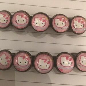 Two (2) Pink Kitty or Black Kitty 5-row vintage Brass Barrette