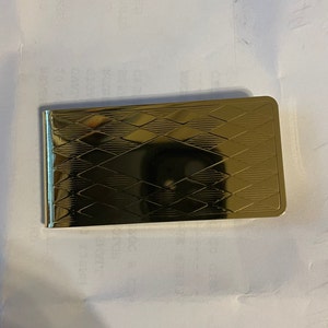 Fermasoldi Art Deco in oro o argento con diamanti