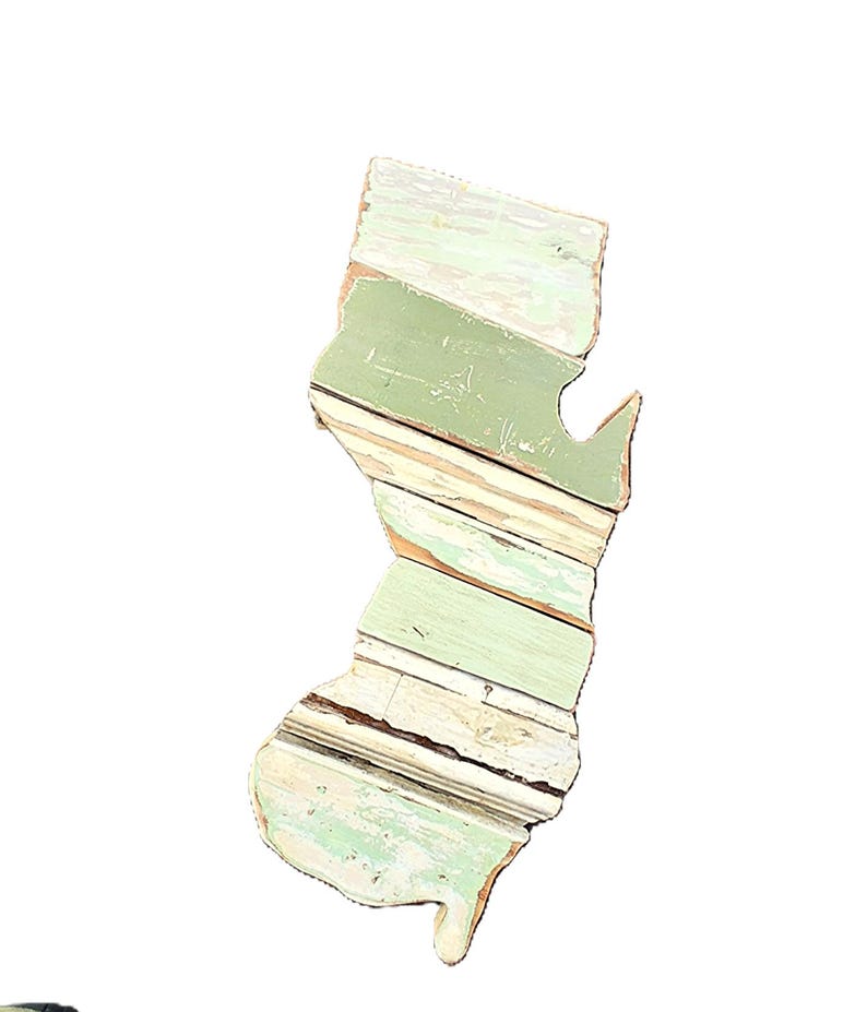 May include: A distressed wooden sign, inscribed with "Welcome to our home" in a handwritten font. The sign has a rustic finish, ideal for a front door or hallway, creating a welcoming atmosphere.