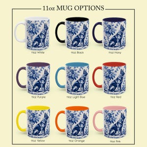 May include: Nine 11-ounce ceramic mugs with different colored rims. Each mug features a white and blue design of a German Shepherd dog sitting in a floral pattern.