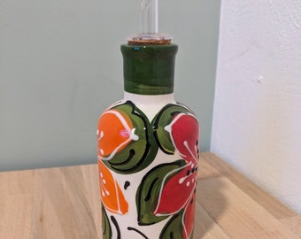 Ölflasche aus spanischer Keramik mit Blumen
