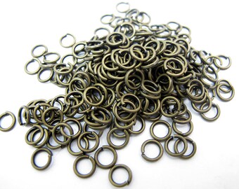 Antiqued Brass Plated Round Jump Rings - 6mm - 24 Grams (approximately 225x) (F587)