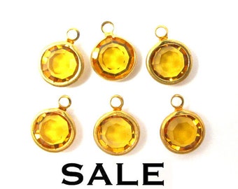 Ciondoli a canale in cristallo Swarovski con strass arancioni e topazio vintage (12 mm) (6 pezzi) (S564) SALDI - 25% di sconto