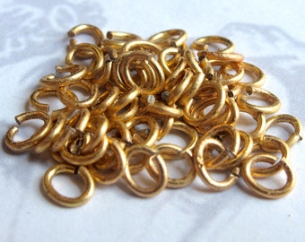 Raw Brass Jump Rings - 7mm x 6mm - 20 grams - (approx 250x) (F589)