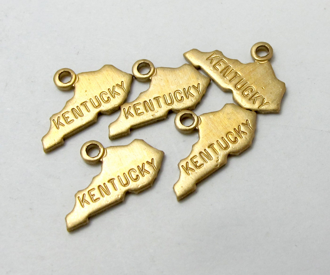 Engraved 6X A415-A Tiny Raw Brass Kansas State Charms