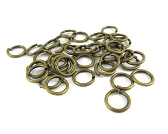 Antiqued Brass Round Jump Rings - 10mm - 13.8 grams (approximately 40x) (F622)