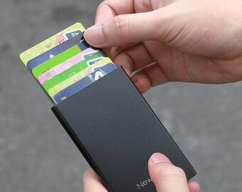 SecureSlide: Sleek Metal Wallet with Automatic Pop-up Card Holder & Anti-Degaussing Technology