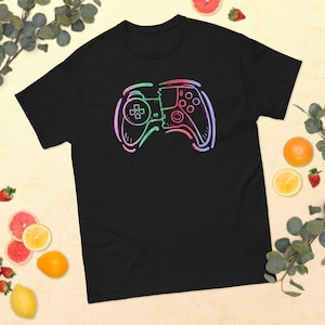 May include: Black t-shirt with a colorful outline of a video game controller.
