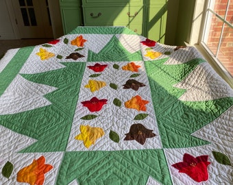 Vintage quilt.  Folk art tulips.  Handmade, green, red, yellow brown.  88x72.  Appliqué quilt