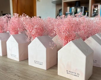 Customizable "Flowering House" wedding favor in the shape of a house with dried flowers.