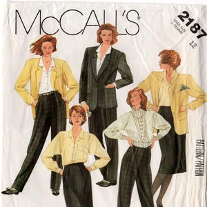 May include: A vintage McCall's sewing pattern featuring Liz Claiborne designs. The pattern includes illustrations of women's suits, blazers, skirts, and sweaters. The cover displays the number 2187 and the size 12.