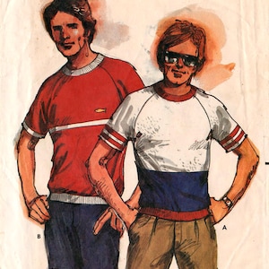 May include: A Butterick 3116 sewing pattern envelope for size large, featuring illustrations of two shirts and shorts. One shirt is red with a white stripe, the other is white, blue, and red with striped sleeves. Text includes FAST & EASY.