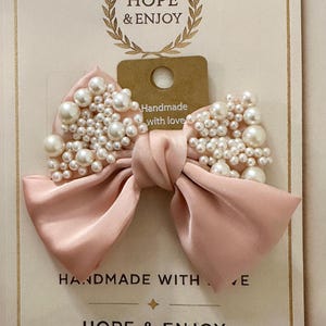 Handmade Baby Pink Pearl Bow Hair Clip: Elegant Satin Statement