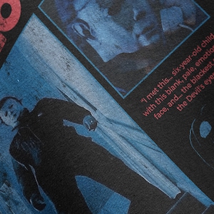 Close up image of the black Halloween 1978 t-shirt showcasing the detailed vintage style graphic of Michael Myers from the classic horror movie directed by john carpenter