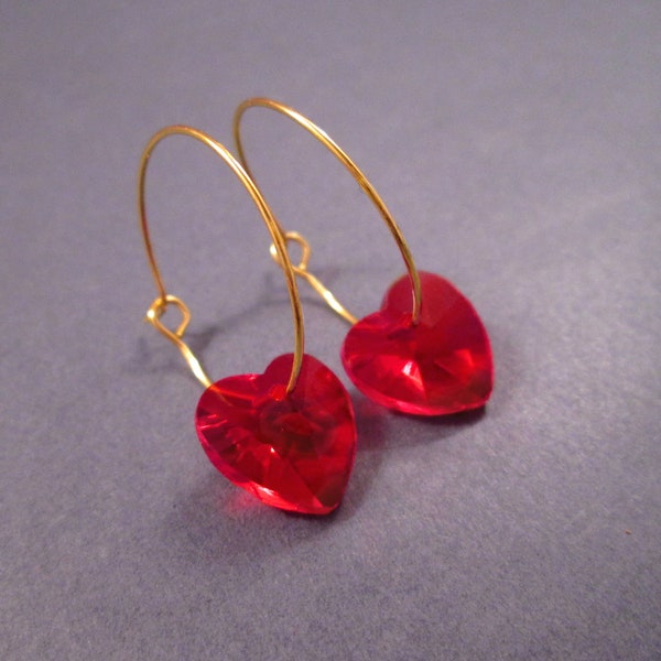 GOLD HEART SHAPE EARRINGS W/ RED CRYSTAL HEARTS main image 0